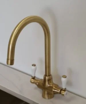 Elevate your kitchen design with the Lever Ab Tap. Order now for a high-quality antique brass kitchen mixer tap that blends style and durability.
