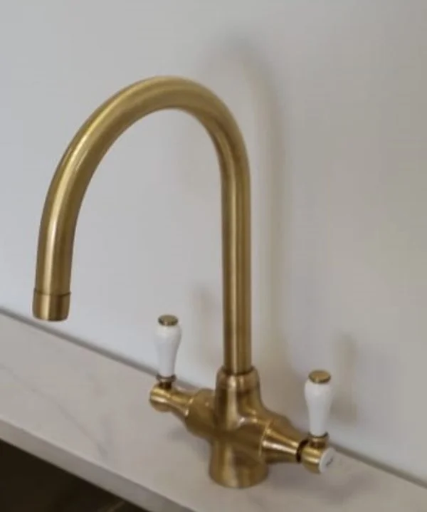 Elevate your kitchen design with the Lever Ab Tap. Order now for a high-quality antique brass kitchen mixer tap that blends style and durability.